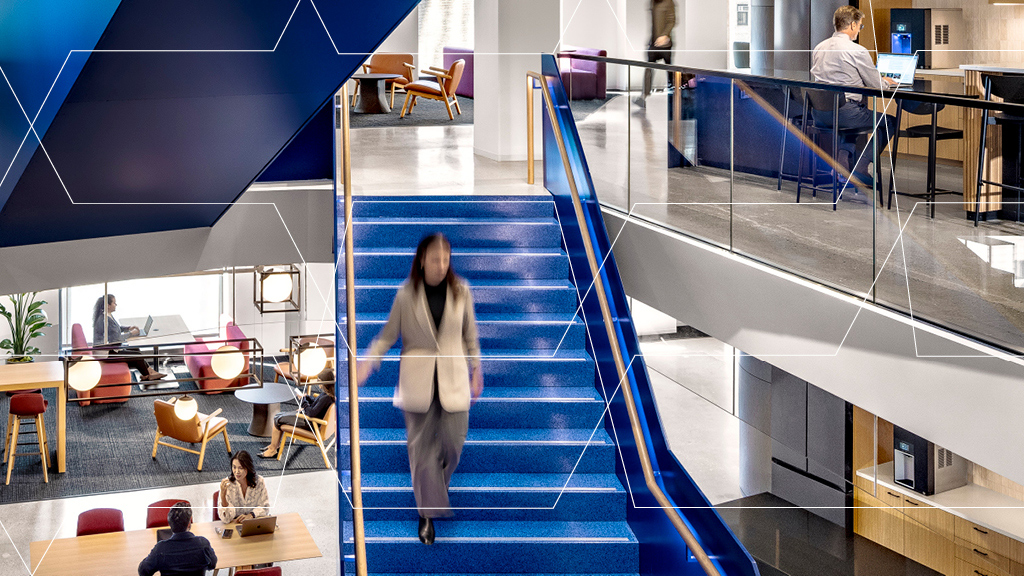 A person walking up a staircase.